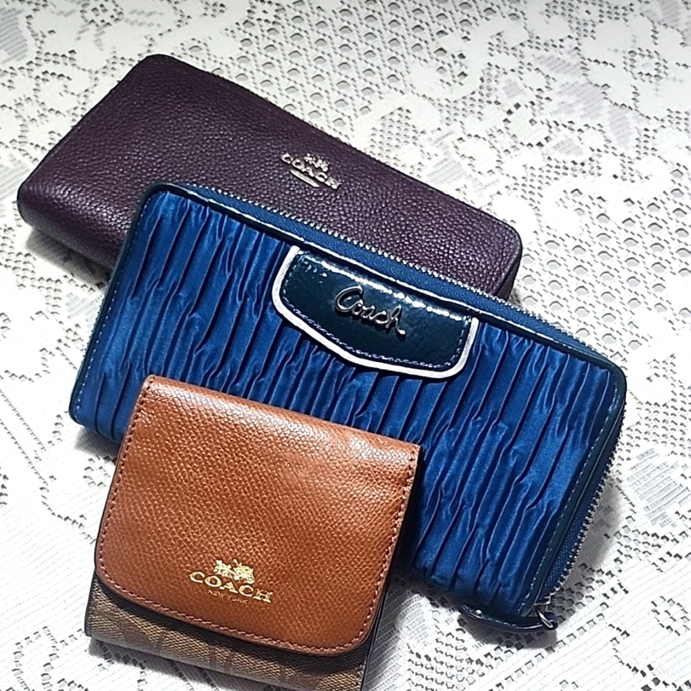 3 Coach Wallet Trio - Purple, Blue, and Brown
